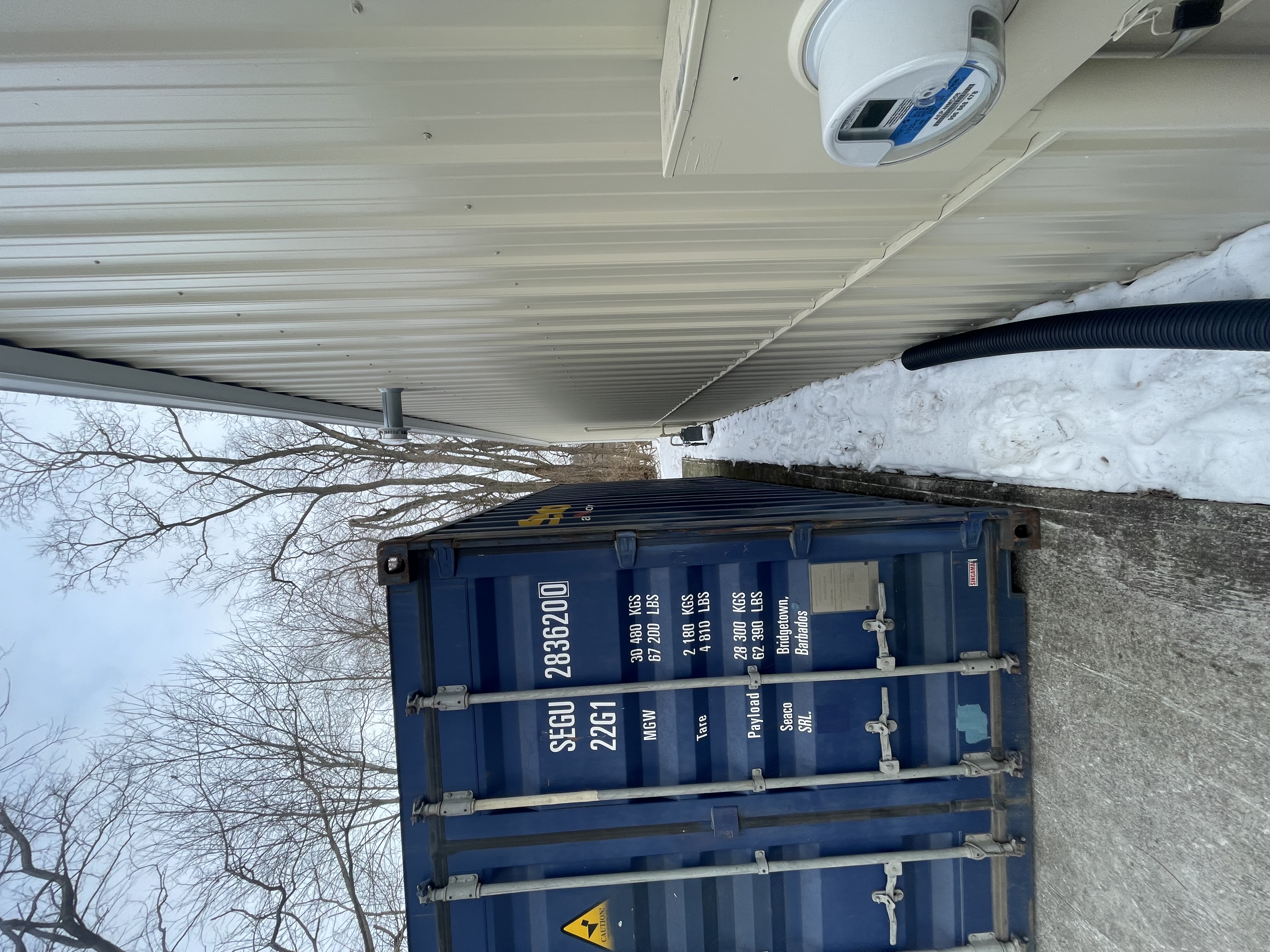 20 ft Cargo Worthy shipping container, exterior, delivered to residential property